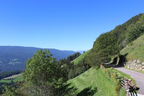 a winding road on the side of a mountain at Leitnerhof in Terento