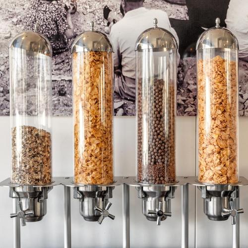 a group of four food jars filled with cereal at Hotel Villa d'Amato in Palermo