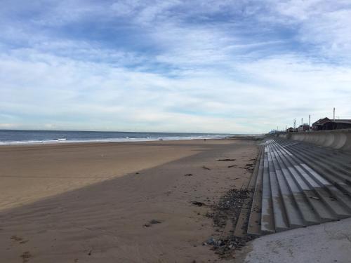 a view of a beach with the ocean in the background at The Beacon Hotel in Redcar