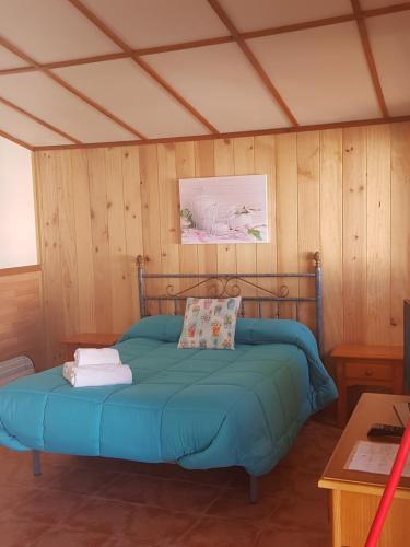 Voodi või voodid majutusasutuse Camping Ruta del Purche toas
