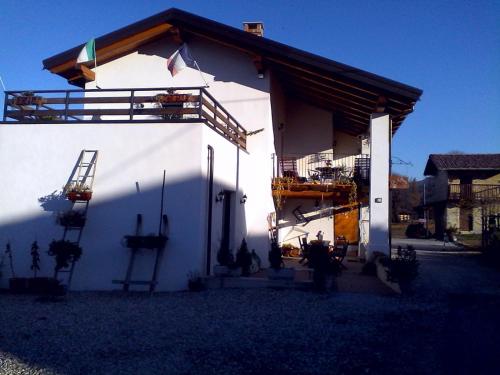 a house being constructed with a crane on the side of it at Bed and Breakfast Ca D'Pandin in Peveragno
