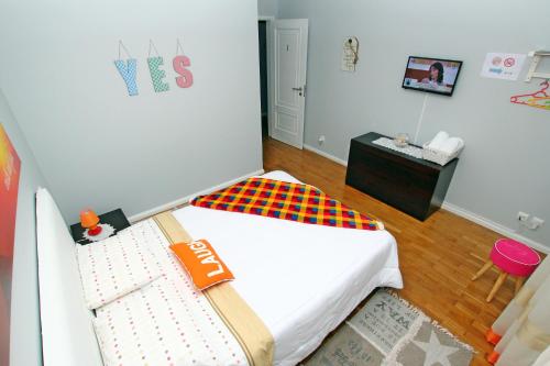 Postel nebo postele na pokoji v ubytování Guest House Pereira