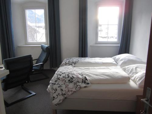 Gasthof Sonne Häselgehr tesisinde bir odada yatak veya yataklar