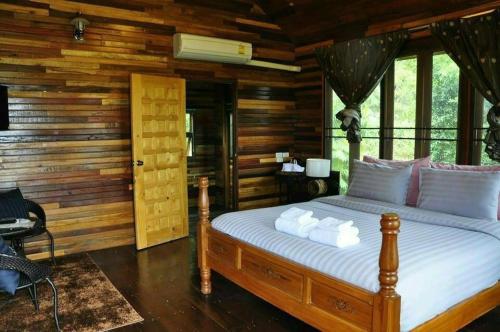 Krevet ili kreveti u jedinici u okviru objekta Maingern Maithong Resort