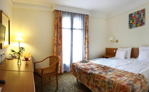 Una cama o camas en una habitación de Park Hotel Hévíz