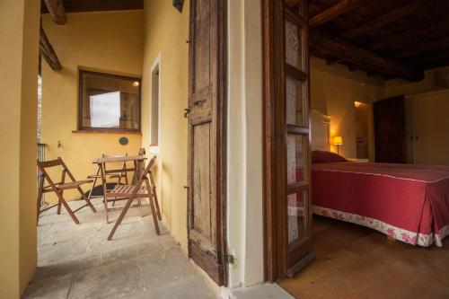 Lova arba lovos apgyvendinimo įstaigoje Castello di Grillano Guest House