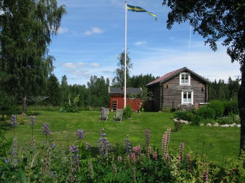 Jardín al aire libre en Stuga Lugnvik