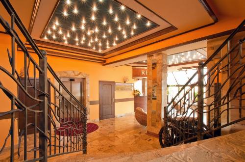 a hallway with a ceiling with star lights at Skalny Dworek in Nowy Targ