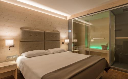 Postelja oz. postelje v sobi nastanitve Hotel Villa Argentina