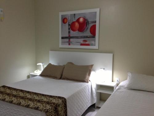 Katil atau katil-katil dalam bilik di Cithos Hotel