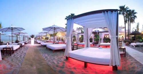 Ένα ή περισσότερα κρεβάτια σε δωμάτιο στο Playa Miguel Beach Club