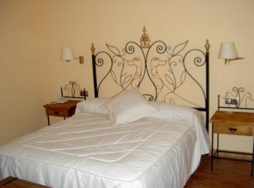 Uma cama ou camas num quarto em Manrique de Lara