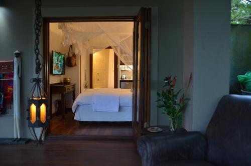 Ένα ή περισσότερα κρεβάτια σε δωμάτιο στο Jakita's Guest house
