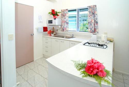 Kuchyň nebo kuchyňský kout v ubytování Sunhaven Beach Bungalows