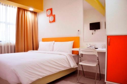 Postel nebo postele na pokoji v ubytování YY318 Hotel Bukit Bintang