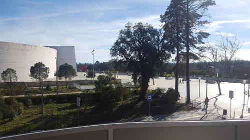 a view of a building with a parking lot at Hotel Aleluia in Fátima