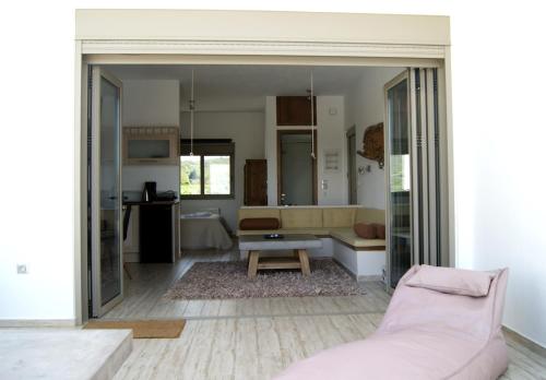 a living room with a couch and a table at Manna Gea in Vonitsa