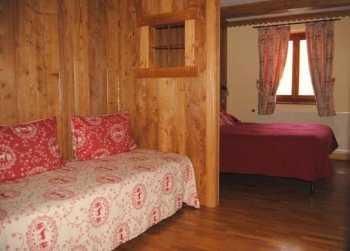 Ένα ή περισσότερα κρεβάτια σε δωμάτιο στο Chalet Plan Gorret
