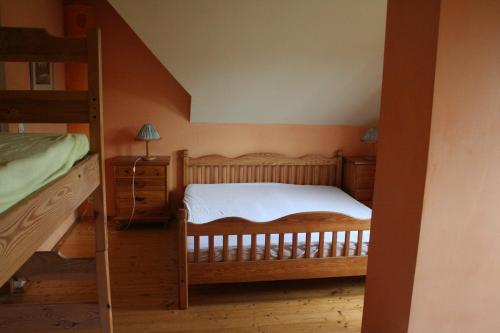 Cama o camas de una habitación en Dom Mazury