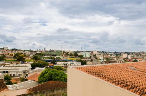 a view of a city from the roof of a building at Hotel XV Duo in Telêmaco Borba