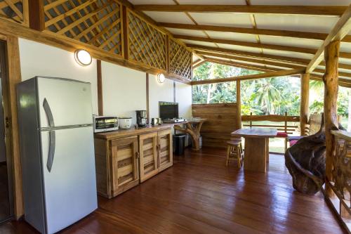 Kjøkken eller kjøkkenkrok på Passion Fruit Lodge