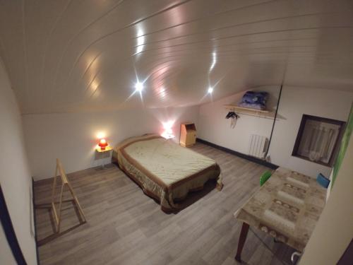 Postel nebo postele na pokoji v ubytování Gîte du Plainet