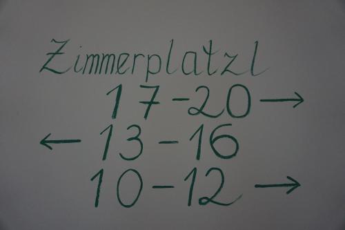 a whiteboard with a handwritten handwriting on it at Schlafplatzl in Marchtrenk