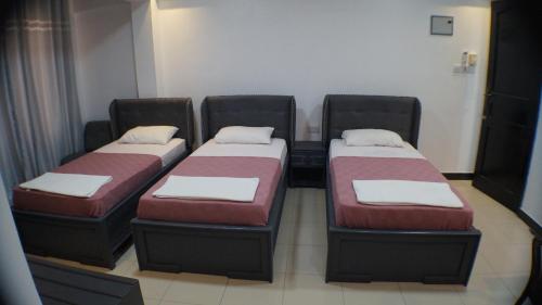 Postel nebo postele na pokoji v ubytování Econo Lodge