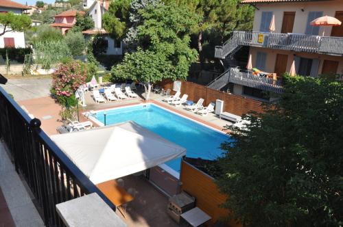 an overhead view of a swimming pool in a hotel at Residence Al Lago in Castiglione del Lago