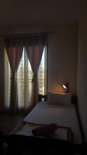 Postel nebo postele na pokoji v ubytování Villa Meca