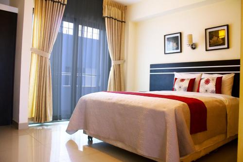 Cama o camas de una habitación en Country Hotel