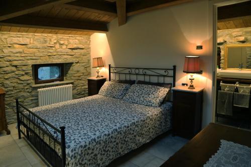Ein Bett oder Betten in einem Zimmer der Unterkunft Casa Kuraj