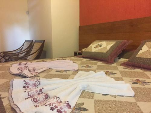 Krevet ili kreveti u jedinici u objektu Hotel Fazenda Palestina