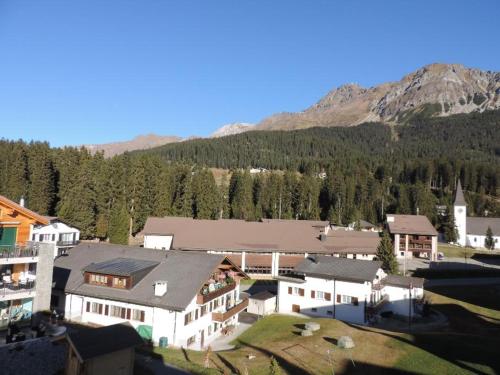 an aerial view of a town with a mountain at Sotmirana 53 (316 Sh) in Lenzerheide