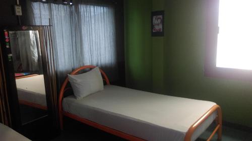 Mr. Clean Guesthouseにあるベッド