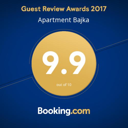 a yellow circle with the words guest review awards appointment babka at Apartment Bajka in Mokra Gora
