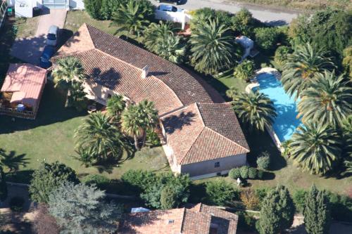 an overhead view of a house with a swimming pool at Villa Alizée B&B in Saint-Tropez