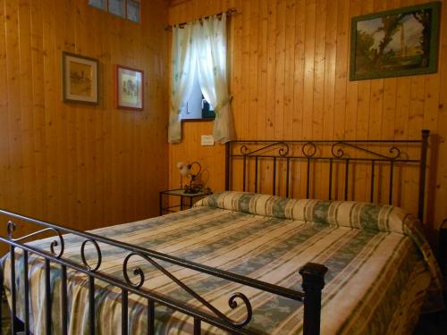 B&B La Querciaにあるベッド