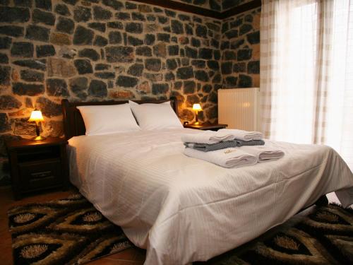 Ένα ή περισσότερα κρεβάτια σε δωμάτιο στο Yades Pozar