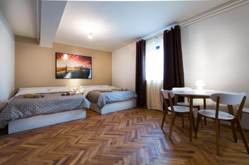 Krevet ili kreveti u jedinici u okviru objekta New rooms & apartments in Ljubljana