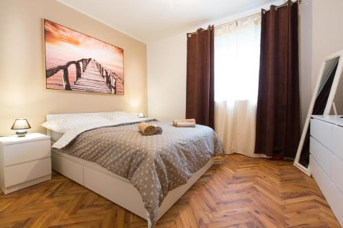 Ein Bett oder Betten in einem Zimmer der Unterkunft New rooms & apartments in Ljubljana