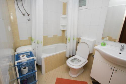 Ένα μπάνιο στο Apartments Mio