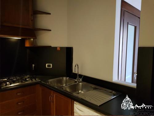 Una cocina o zona de cocina en Borgo Pio 91