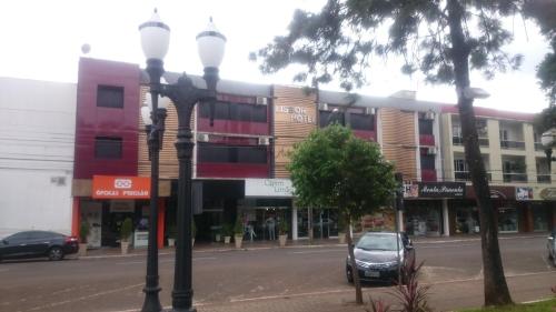 a street light in front of a building at Hotel Lisbor in Francisco Beltrão