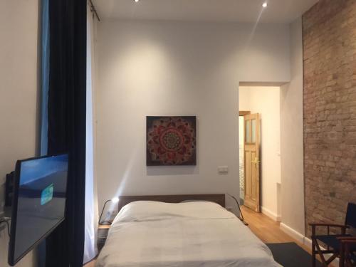 Ein Bett oder Betten in einem Zimmer der Unterkunft City-Apartment Berlin Charlottenburg