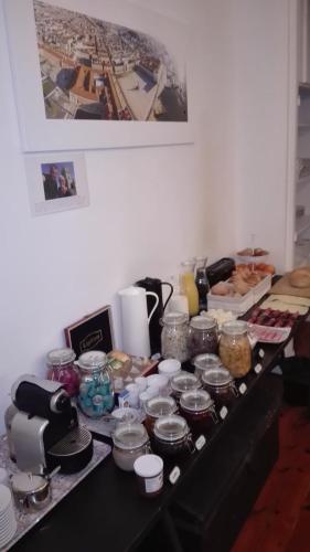 a counter with a bunch of food on it at Feeling Chiado 15 in Lisbon