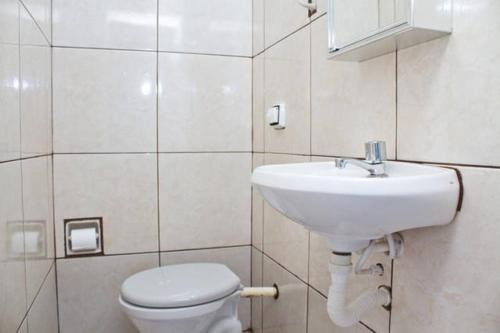 Ванная комната в Tião Botelho Guest House