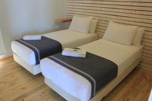 Curi Lodge Pichilemuにあるベッド