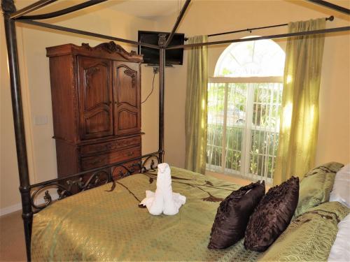 מיטה או מיטות בחדר ב-3 Bedroom Kissimmee Area Home