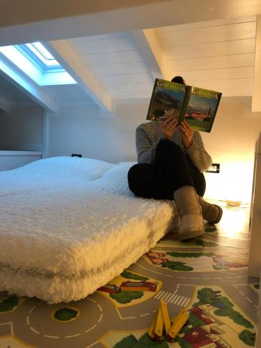 Ένα ή περισσότερα κρεβάτια σε δωμάτιο στο Casa vacanze La Villetta tra Cinque Terre e Versilia